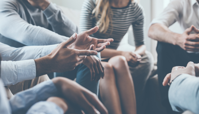 Group of people discussing.